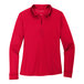 A red Port Authority women's long sleeve polo shirt.