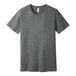 A Bella + Canvas unisex deep heather grey t-shirt with a small logo on the front.