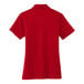 A red Port Authority short sleeve polo shirt for women.