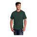 A man smiling and wearing a dark green Port & Company t-shirt.