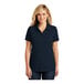 A woman wearing a navy blue Port Authority short sleeve polo shirt.