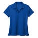 A Nike Dri-Fit blue polo shirt with a white swoosh on the sleeve.