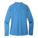 A Port Authority women's long sleeve Carolina blue polo shirt.