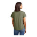 The back view of a woman wearing an olive green AllMade short sleeve t-shirt.