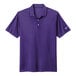 A purple Nike polo shirt with a white Nike logo on the sleeve.