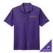 A Nike purple Dri-FIT polo shirt with a white swoosh on the sleeve.