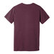 The back of a Bella + Canvas heather maroon t-shirt with a small logo on the front.