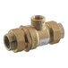 A brass Watts 9D series check valve with a white label.