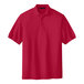 A red Port Authority® silk touch polo shirt.