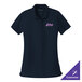 A navy blue Port Authority short sleeve polo shirt with pink writing on it.