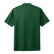 A green Nike polo shirt.