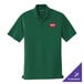 A small deep forest green Port Authority polo shirt with a logo on it.