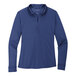 A Port Authority women's long sleeve blue polo shirt.