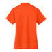 A back view of a medium orange Port Authority polo shirt with a white collar.