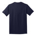 A back view of a navy Port & Company short sleeve t-shirt with the word, 'the' on it.