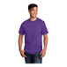 A man wearing a Port & Company Team Purple short sleeve t-shirt.
