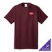 A maroon Port & Company short sleeve t-shirt with a logo on it.