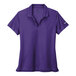 A purple Nike Dri-Fit polo shirt with a white swoosh.
