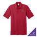 A red Port & Company polo shirt with a green logo.