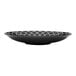 A Libbey black porcelain deep coupe plate with white embossing in a geometric pattern.