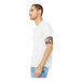 A man wearing a Bella + Canvas white combed ring-spun cotton/poly blend t-shirt.