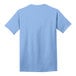 A light blue Port & Company T-shirt with short sleeves on a white background.