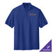 A Port Authority royal blue polo shirt with a logo on it.