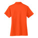 A back view of a Port Authority neon orange polo shirt with a white collar.