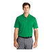 A man wearing a Nike Dri-Fit lucid green polo shirt.