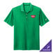 A lucid green Nike Dri-FIT polo shirt with a logo on it.