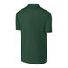 A forest green Sport-Tek polo shirt.