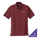 A small burgundy Port Authority polo shirt with a logo on it.