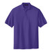 A purple Port Authority® silk touch pique polo shirt.