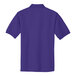 A purple Port Authority silk touch pique polo shirt.