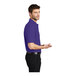 A man wearing a purple Port Authority silk touch polo.