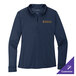 A navy women's long sleeve polo shirt with a logo on the front.