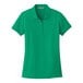 A Port Authority bright kelly green women's polo shirt.
