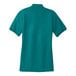 A teal Port Authority short sleeve polo shirt for women.