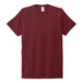 A red AllMade tri-blend t-shirt with a white collar on a white background.