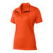 A Sport-Tek women's orange polo shirt with a collar.