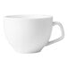 A close-up of a Libbey white porcelain cup with a handle.