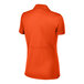 A Sport-Tek women's polo shirt in orange.