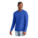 A man wearing a deep royal blue District long sleeve t-shirt.