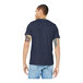 A man wearing a Bella + Canvas heather midnight navy t-shirt.