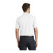 A man wearing a white Port Authority Dry Zone short sleeve polo shirt.