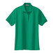 A close-up of a Port Authority kelly green short sleeve polo shirt.