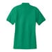 A Port Authority Kelly Green polo shirt for women.