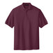 A maroon Port Authority® Silk Touch™ Pique Polo shirt.