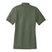 A back view of a Port Authority women's clover green short sleeve polo shirt with a white collar.