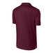 A maroon Sport-Tek short sleeve polo shirt on a white background.